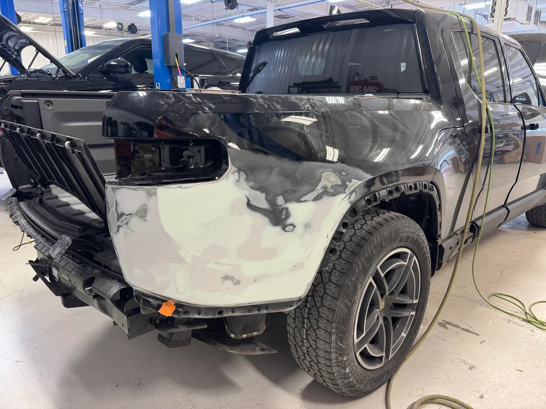 Rivian’s One-Piece Bedside Turned A Dinner-Plate Dent Into Used Corolla Money