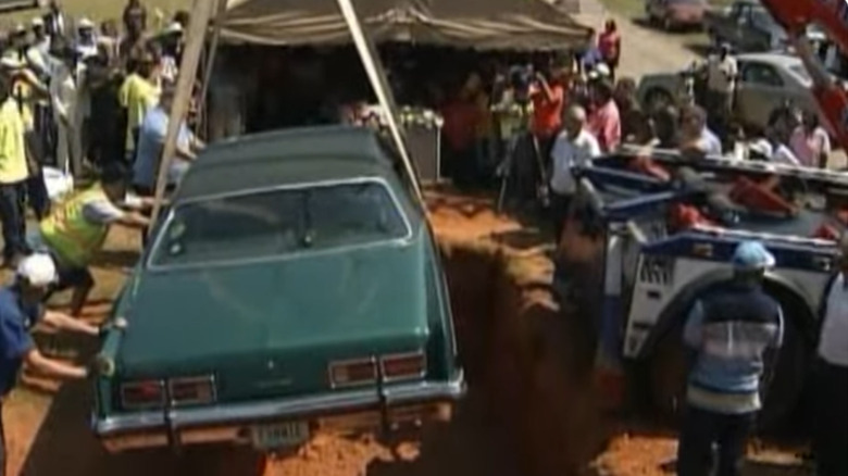 It Took A Crane And Several Cemetery Plots To Bury A Man Inside His Chevrolet Corvette