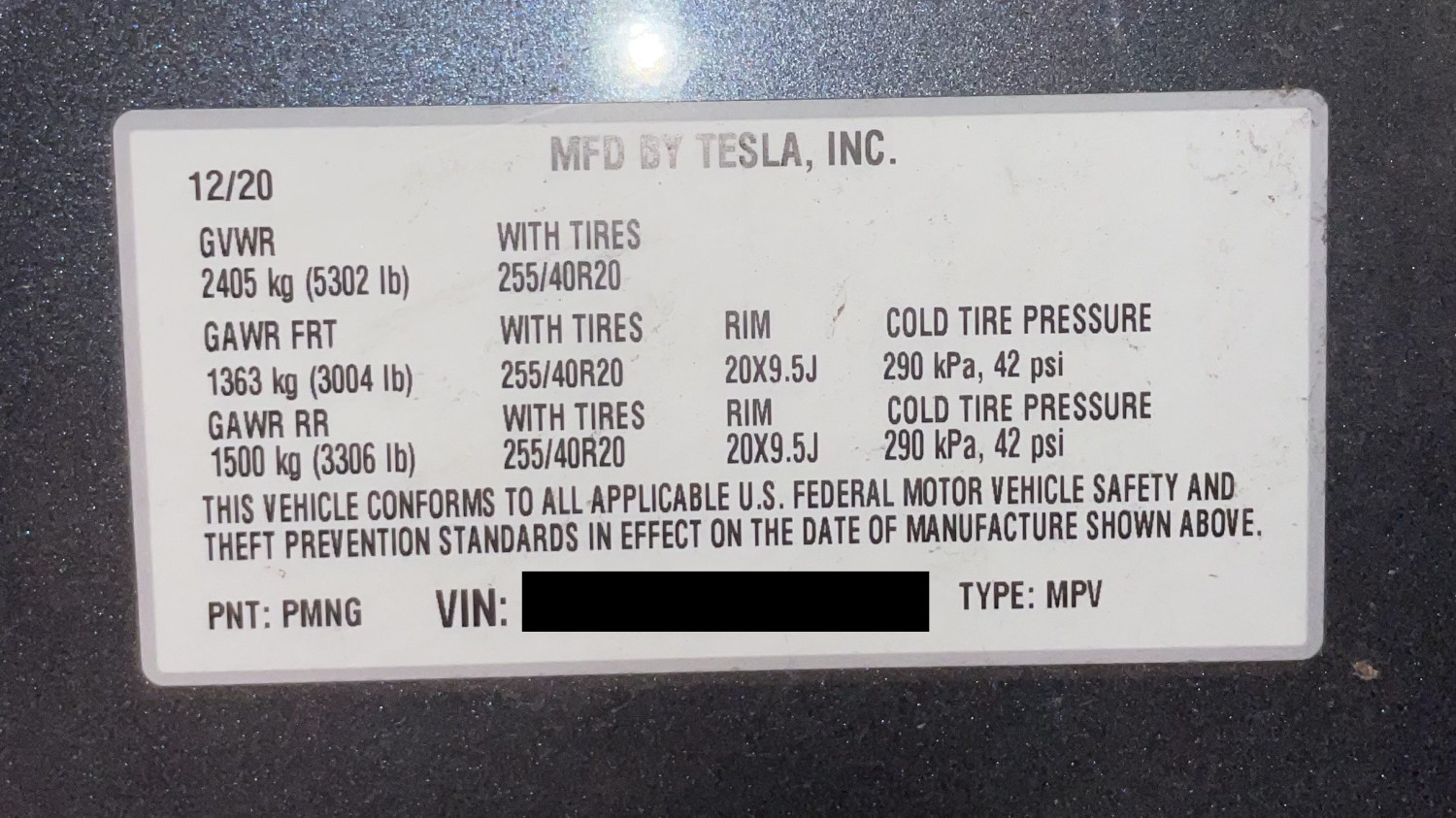 Tesla is recalling 14,575 Model Ys because they may be missing a sticker