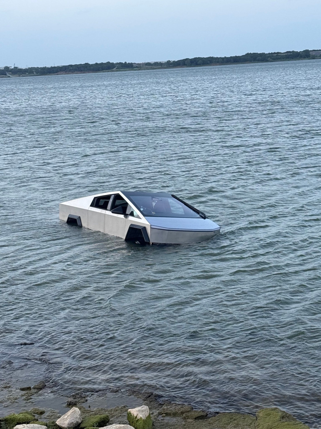 Tesla, Cybertruck, Man Arrested After Driving Tesla Cybertruck Into Texas Lake, Then Abandoning It: Police