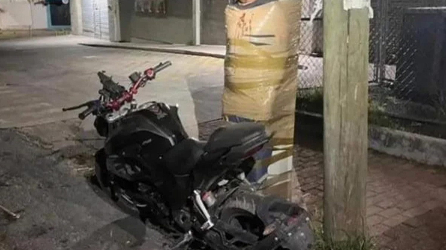 Mexico's 'Batman' Vigilante Catches, Tapes Up Alleged Motorcycle Thieves