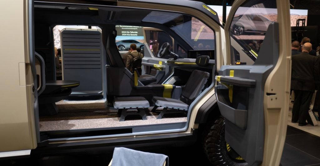 Kia’s Radical EV Camper Van Can Make Power From Wind, Water — and It Has a Rooftop Tent