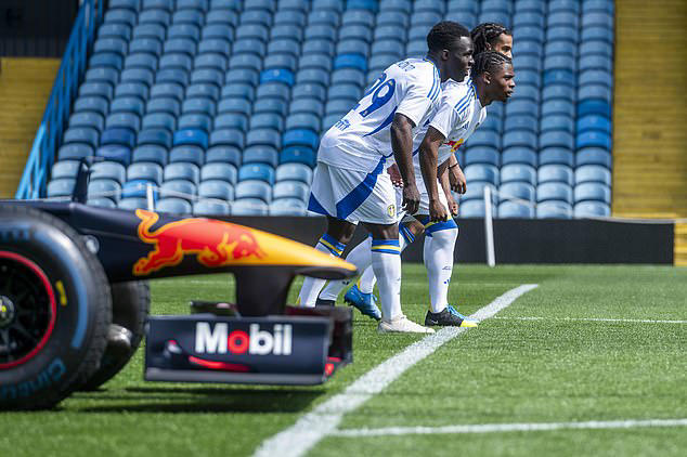 Leeds stars race Red Bull F1 car at Elland Road after challenging driver to contest amid Premier League return