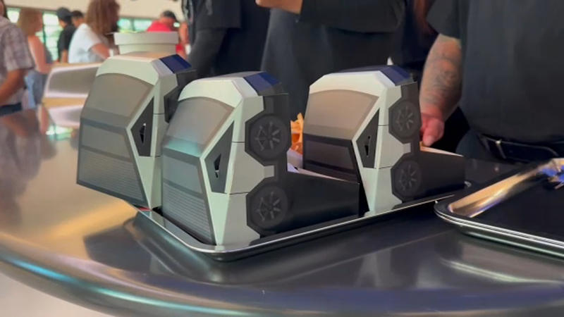 Fans wait for hours to visit Tesla diner and drive-in movie theater in Hollywood on opening day