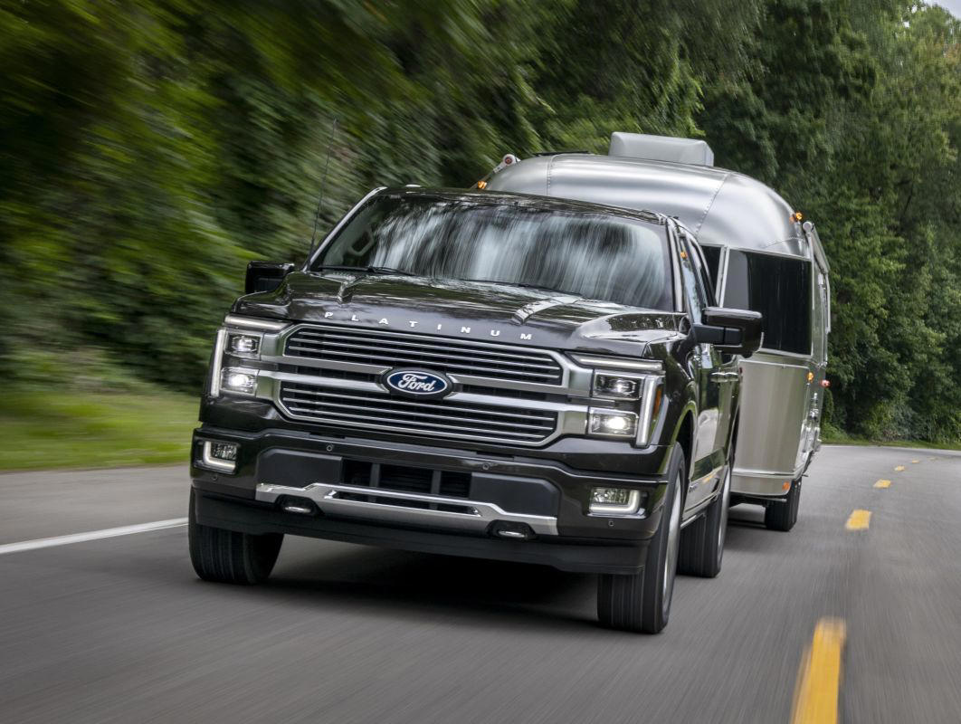 Fired employee accused of shooting Ford dealership and slashing 50 tires