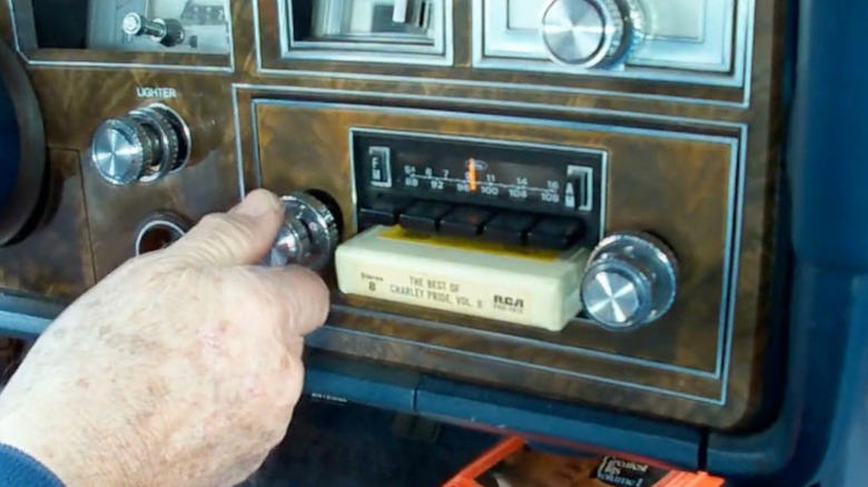 When did automakers switch from 8-track players to cassette decks?