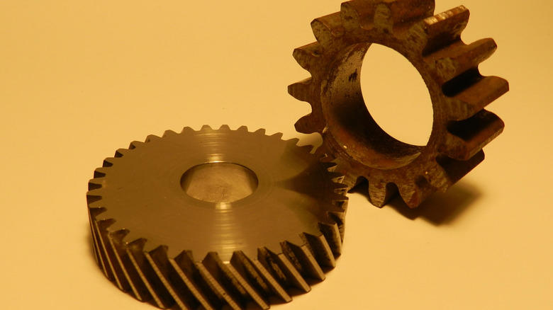 If straight cut gears are so great, why don't street cars use them?
