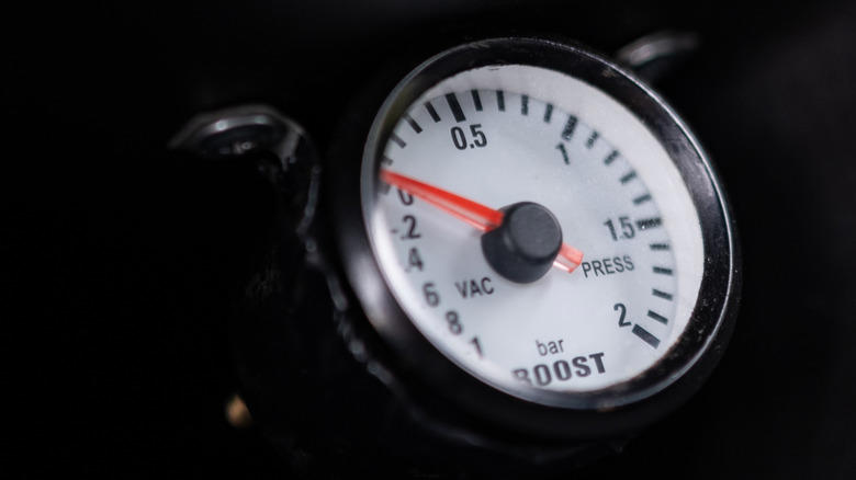 What's the purpose of a carburetor vacuum line?