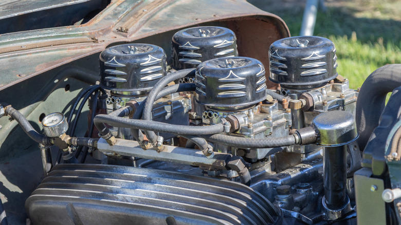 What's the purpose of a carburetor vacuum line?