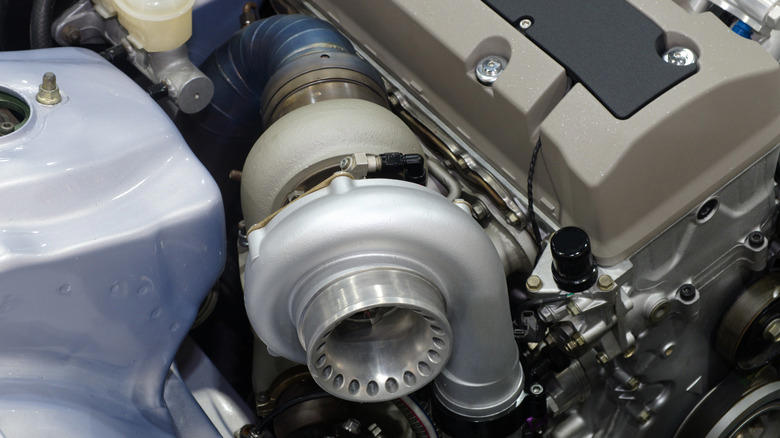 What are the practical limits of turbo boost pressure?