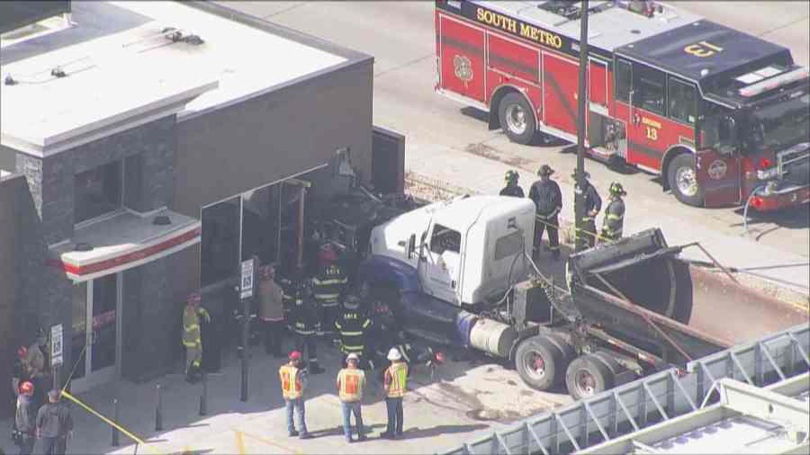 Semitrailer driver charged in crash into Littleton gas station