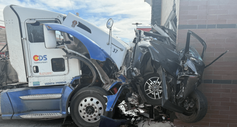 Semitrailer driver charged in crash into Littleton gas station