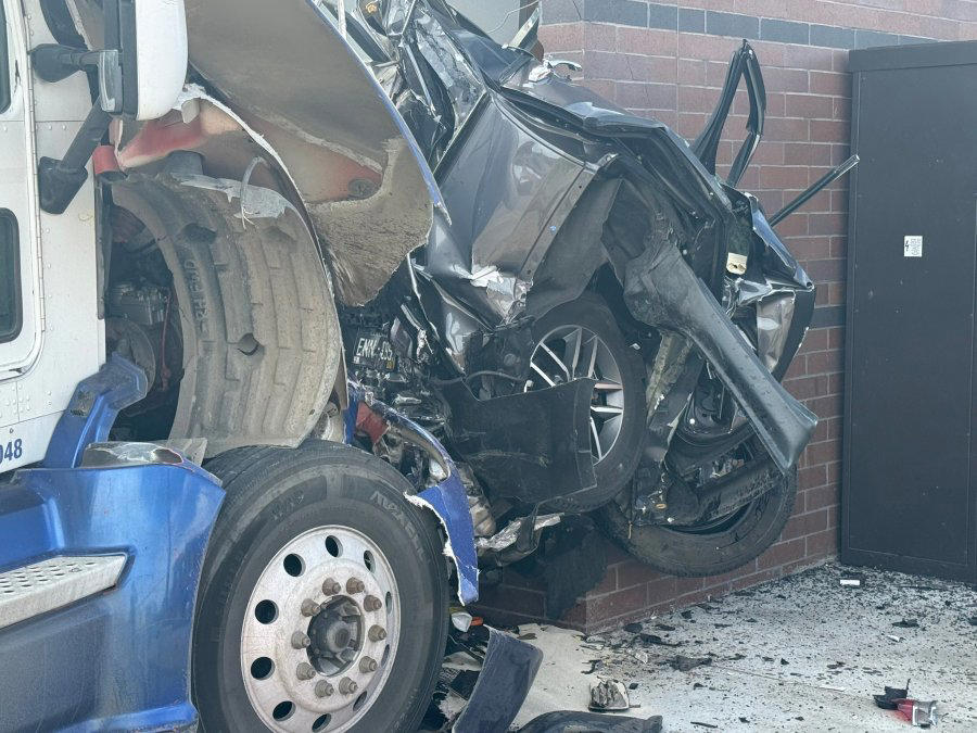 Semitrailer driver charged in crash into Littleton gas station