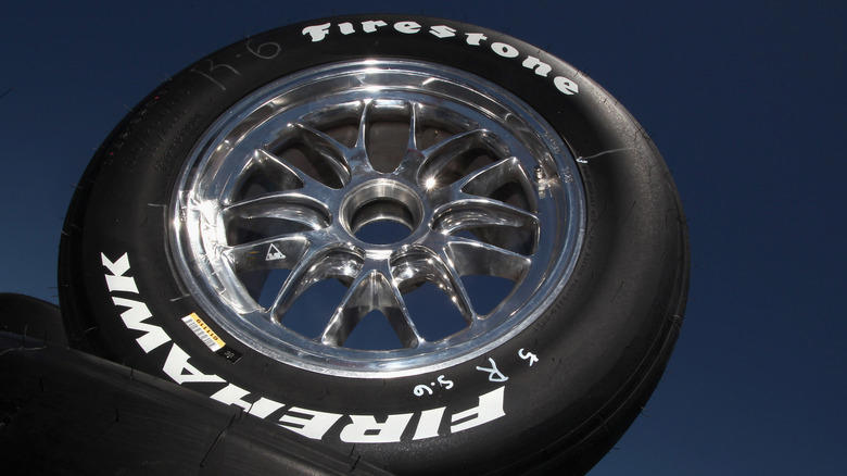 Who owns Firestone tires and where are they made?