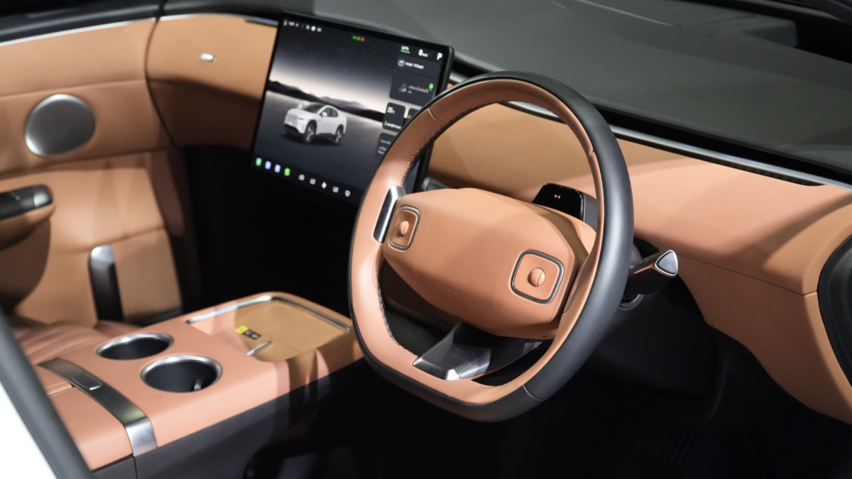 This electric SUV turns into a pickup truck at the press of a button