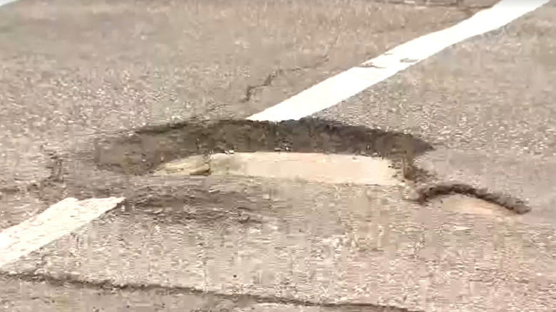 18-year-old Metro Detroit pothole filler shows the city how to do their job