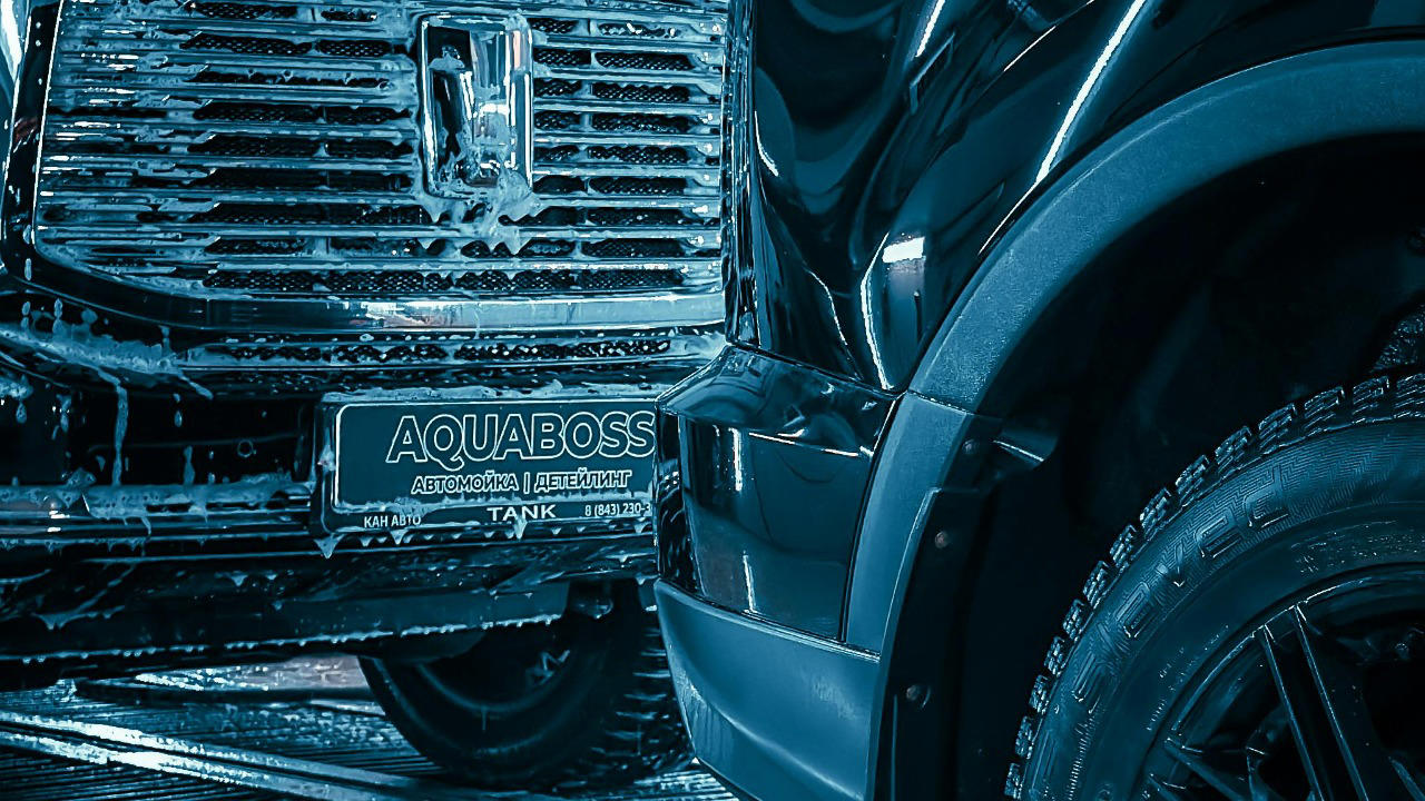 Driver says the car wash conveyor pushed his SUV into the vehicle ahead and the manager blamed sensors