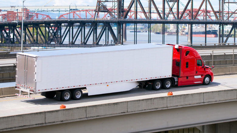 Why do some semi-truck trailers have side skirts?
