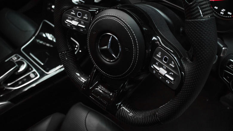Why do some steering wheels have a flat bottom?