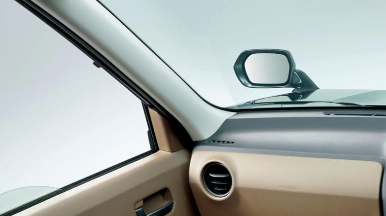 Why did Japanese cars have mirrors on the hood?