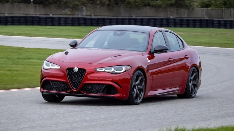 What does the four-leaf clover badge mean on Alfa Romeo vehicles?