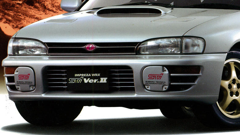 The reason why some Subaru STIs have pink logos