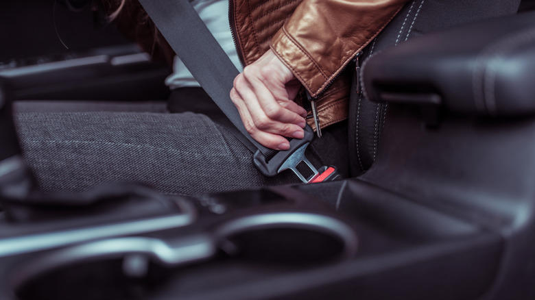 Why did car manufacturers stop using automatic seat belts?