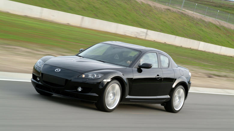Why rotary engines use two different spark plugs