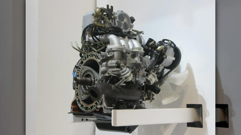 Why rotary engines use two different spark plugs