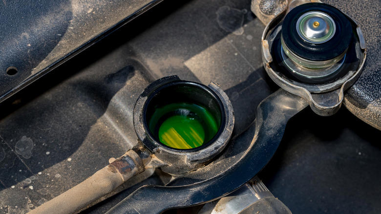 Do you need to drain old coolant before adding more to your car?