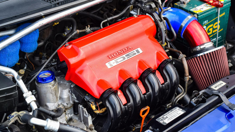Why do some 4-cylinder engines have eight spark plugs?