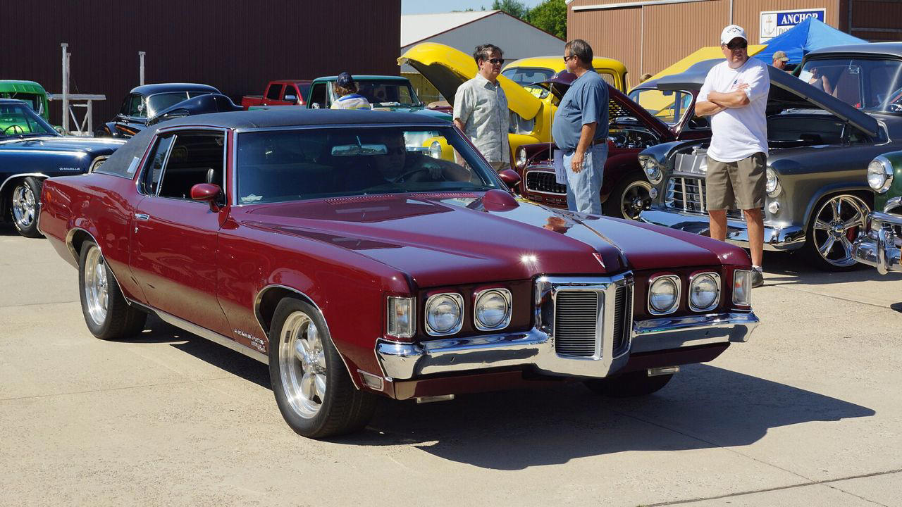 The 1969 Pontiac Grand Prix blends bold styling with performance engineering