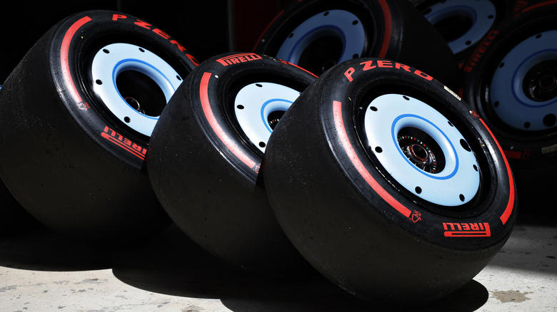 What are the covers on F1 tires for?