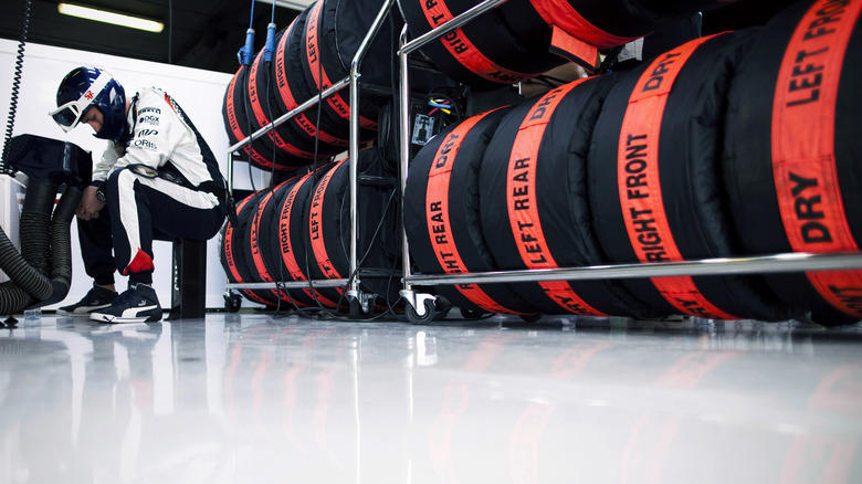 What are the covers on F1 tires for?
