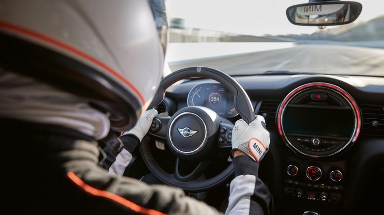 Which is the fastest Mini Cooper model and what is its top speed?