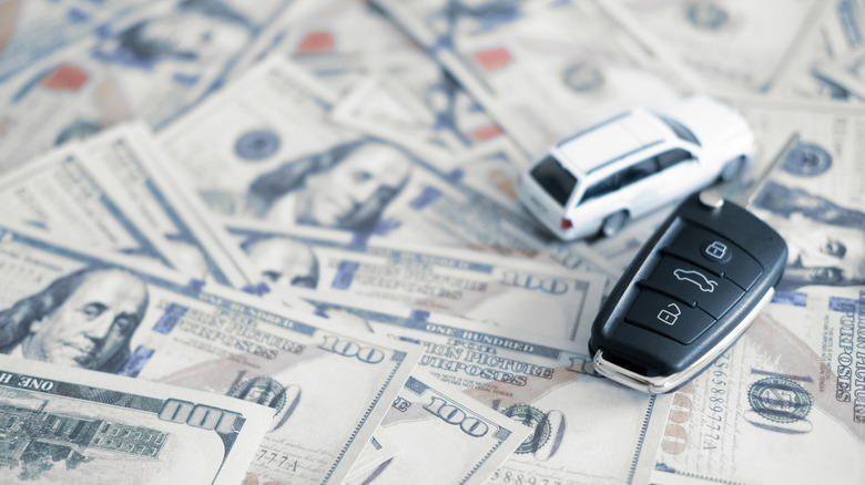 What happens when two people try to buy the same car at the same time?