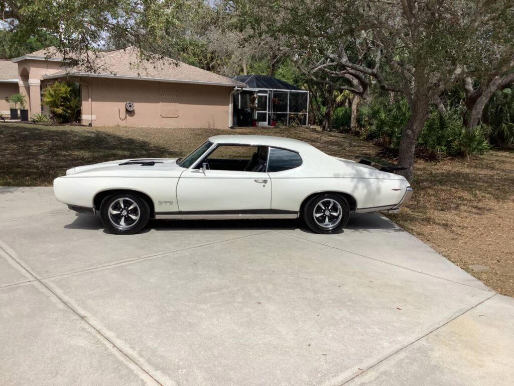 Two 1969 Pontiac GTOs hit the market — one forgotten relic, one 500-HP monster, both facing a deadline