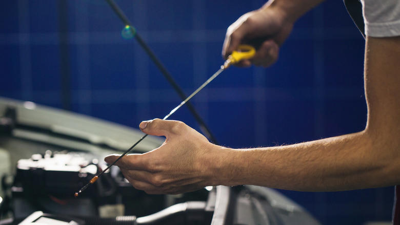Why don't all new cars come with oil dipsticks anymore?