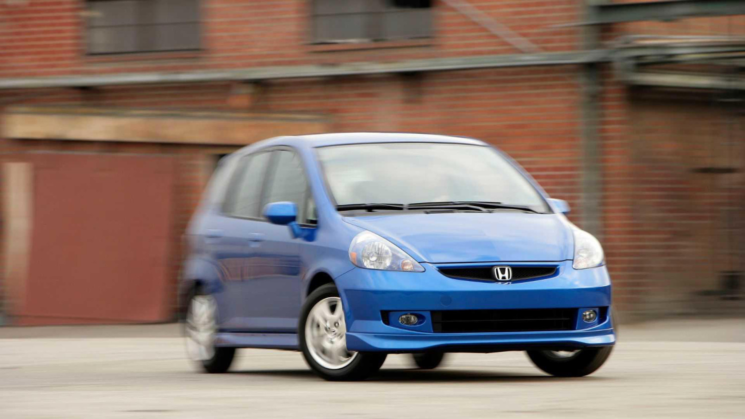 Watch this Honda Fit crash out, roll twice, and drive away like it's nothing