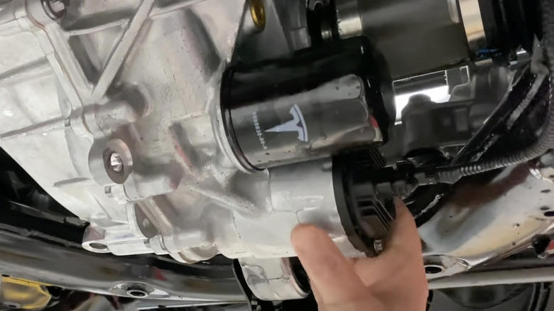 Why Teslas have oil filters (even though they don't use engine oil)
