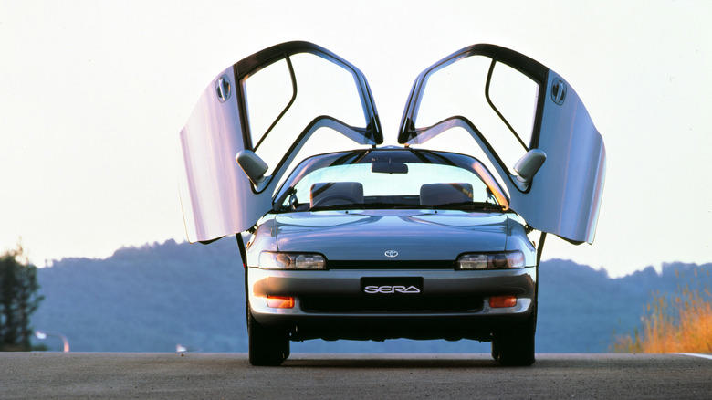 Which classic car had the first butterfly doors?
