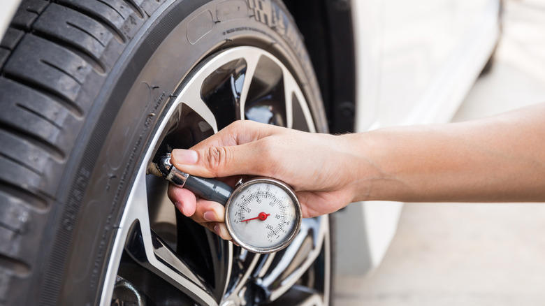 Why do people kick their vehicle's tires?