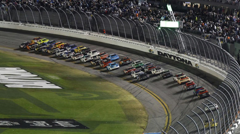 How big is a NASCAR fuel tank &amp; how much gas does the car burn during one race?
