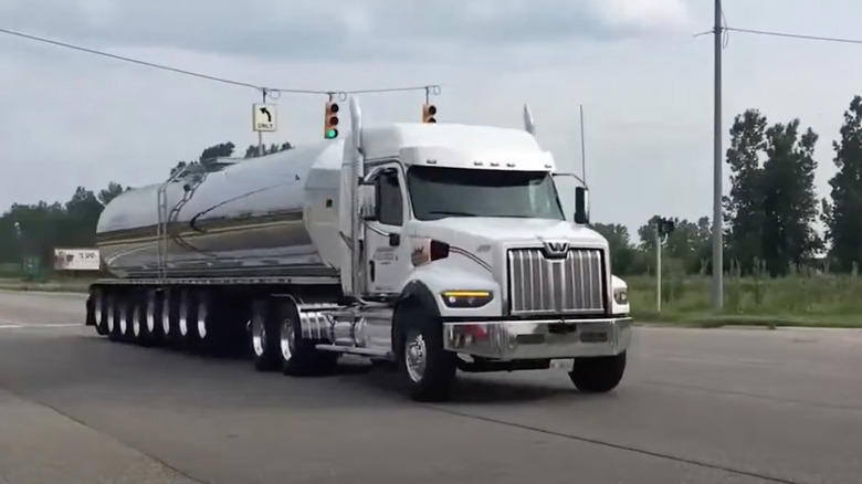 Why do semi trucks in Michigan have so many wheels?