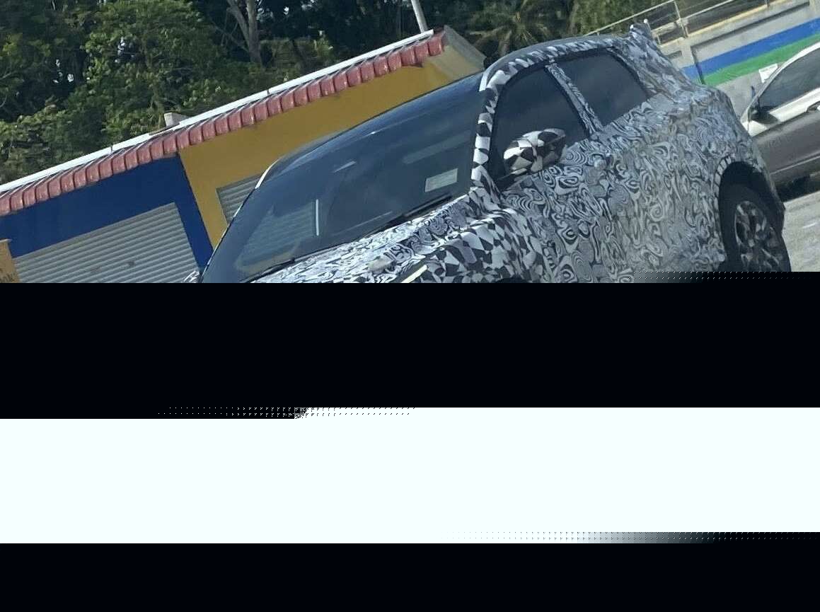 2025 Proton X50 facelift spied with reduced front camo revealing clear look of Binyue L inspired face