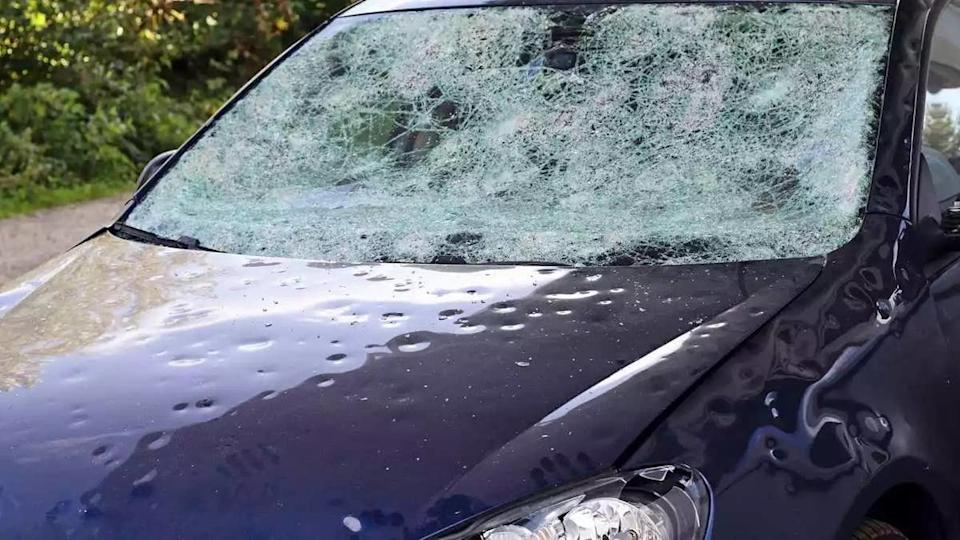 What Golf Ball Hail Actually Does to Your Car: Body Panel Damage, Cracked Glass &amp; Insurance Realities