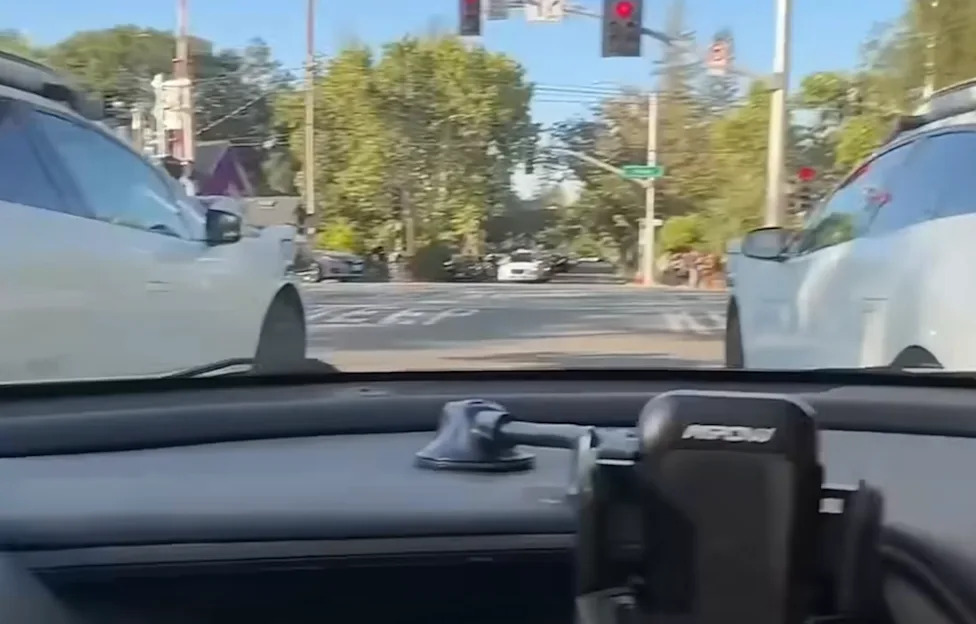 Woman Trapped by Two Rogue Waymo Robotaxis for Nearly an Hour Calls 911: "Is the Officer Going to Argue With a Ghost?"