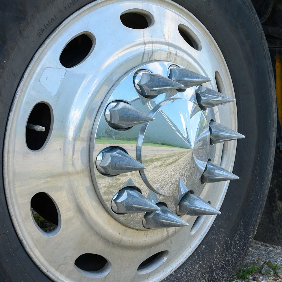Ever Wonder What Those Long Spikes on Semi-Truck Wheels Are For? Here’s the Answer
