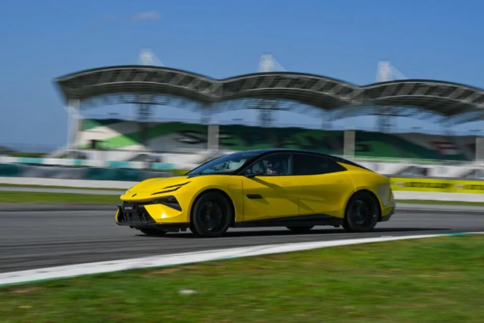 Lotus, Tesla, Lotus Emeya 900 Beats a Modified Tesla by 7 Seconds Around Sepang — in Full Production Trim