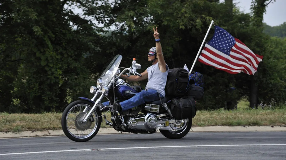 Who Invented The Biker Wave? It Was (Probably) This Iconic Motorcycle Duo